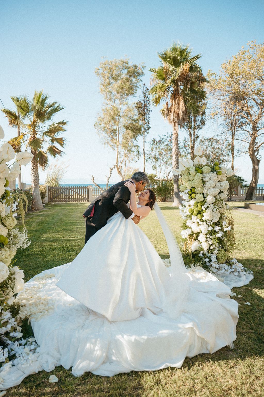 Image may contain Clothing Dress Fashion Formal Wear Gown Wedding Wedding Gown Photography Face Head and Person