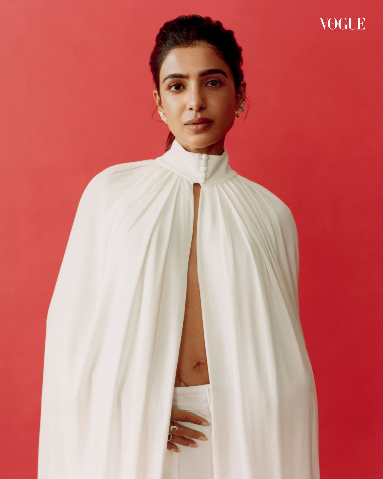 Image may contain Samantha Akkineni Fashion Cape Clothing Face Head Person Photography Portrait and Adult