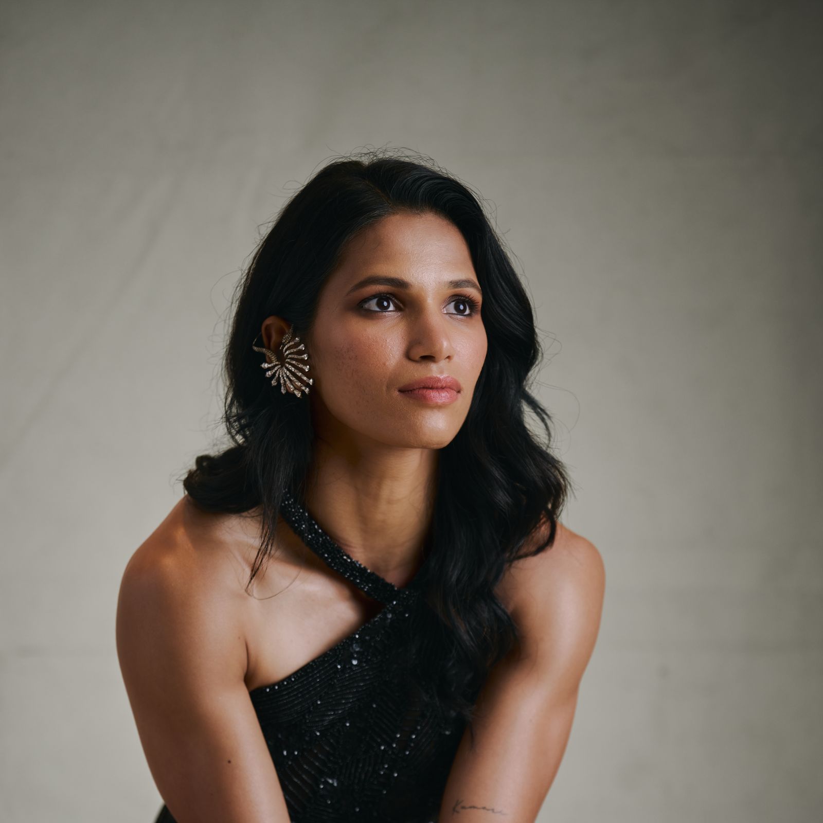 Jyothi Yarraji wore a glittering asymmetric black dress at Vogue Values: Women of Excellence