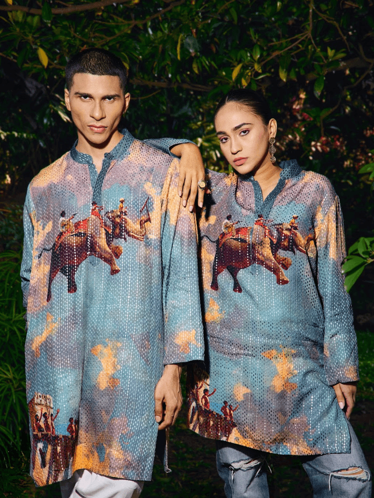 Image may contain Person Adult Clothing Sleeve Face Head Jeans Pants Body Part and Hand