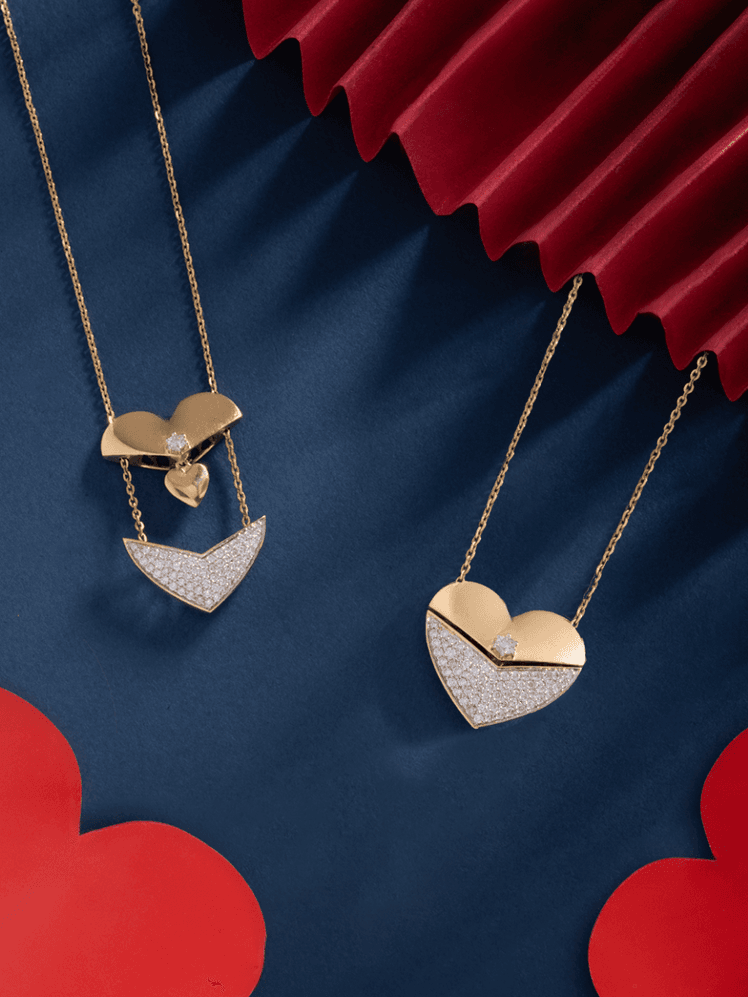 Image may contain Accessories Jewelry Locket Pendant Symbol Necklace and Love Heart Symbol