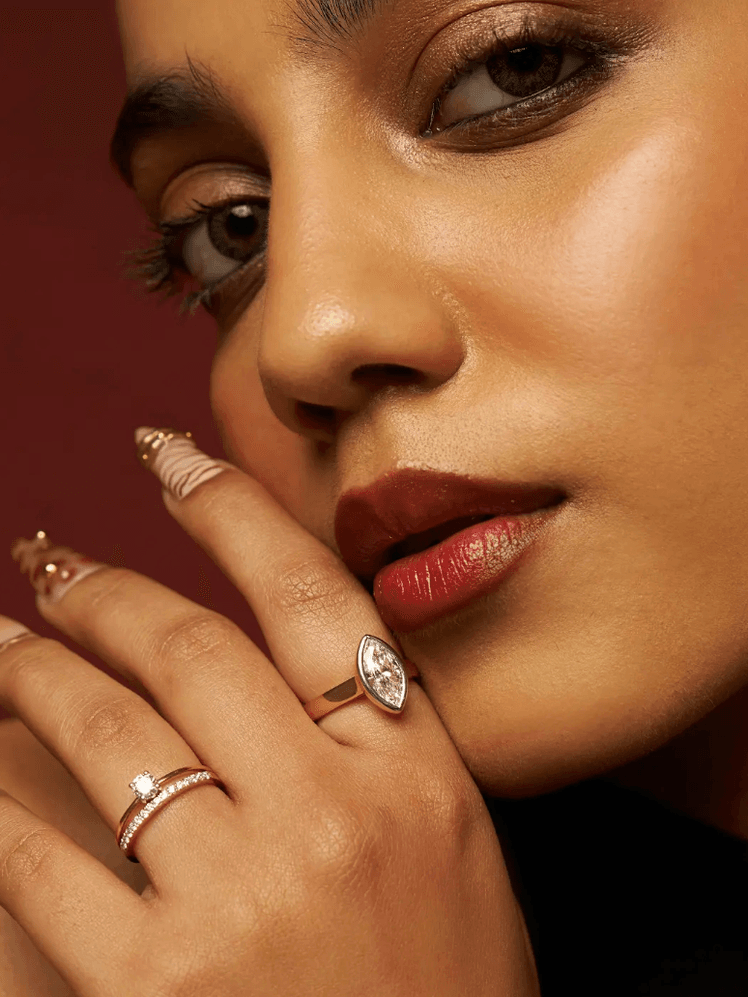 Image may contain Liu Liyang Body Part Finger Hand Person Adult Accessories Diamond Gemstone Jewelry and Skin