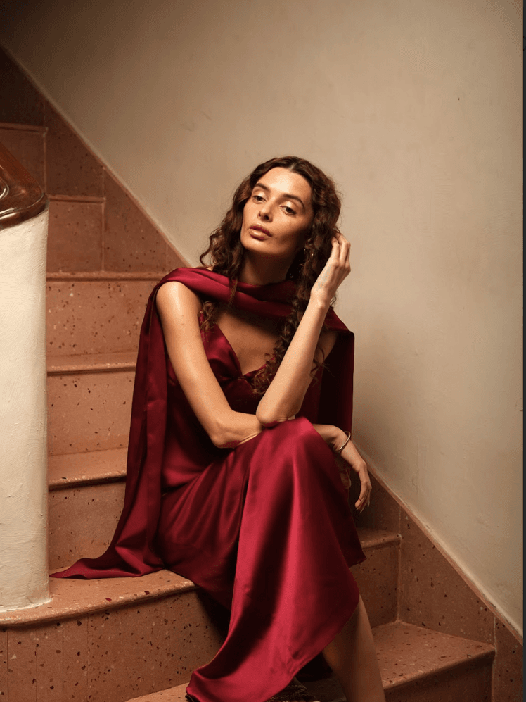 Image may contain Heather StewartWhyte Clothing Dress Evening Dress Formal Wear Architecture Building and House